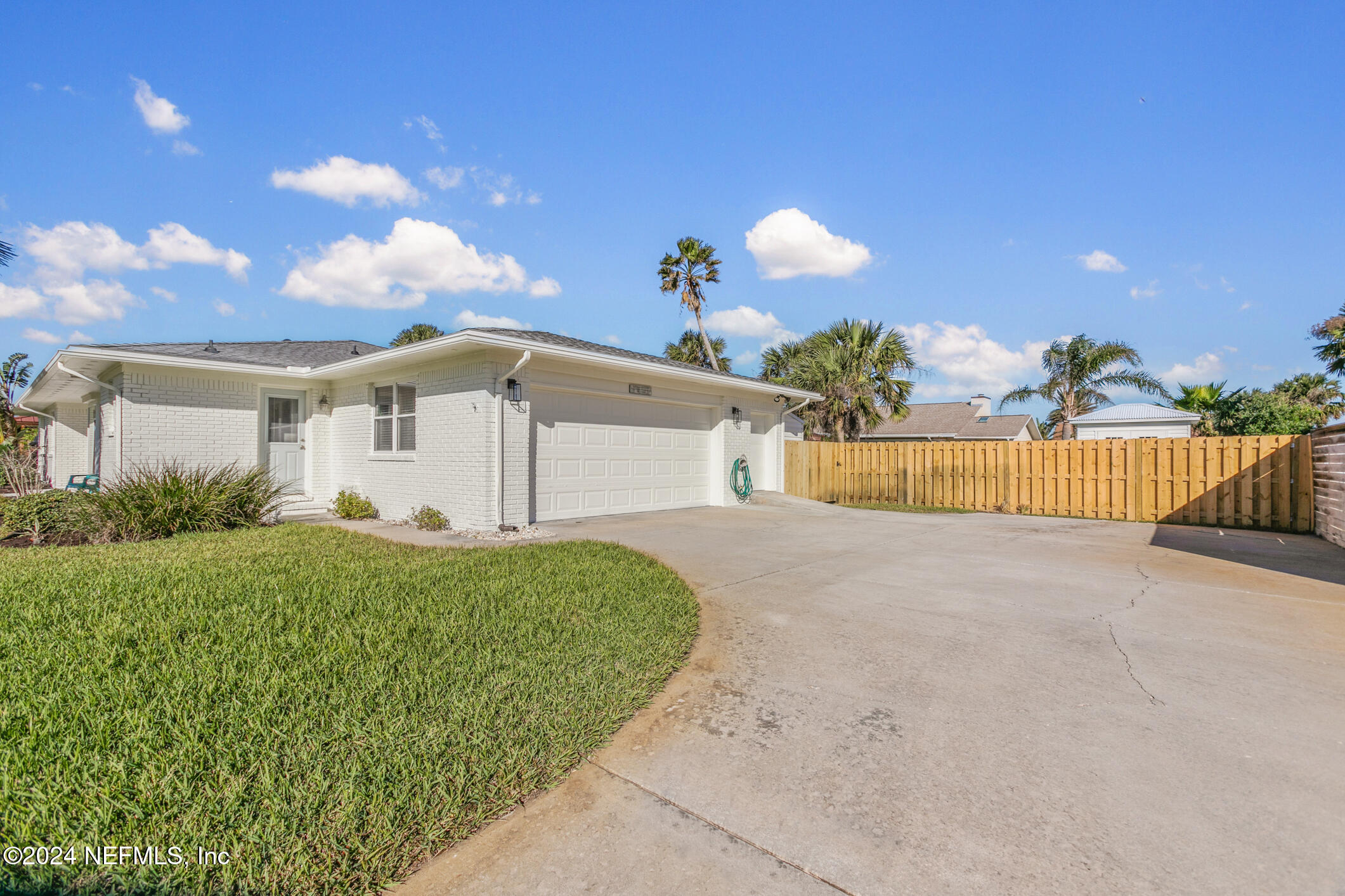 47 Sandpiper Drive St. Augustine, FL 32080 - Photo 44 of 61 a view of a house with a backyard and a garden