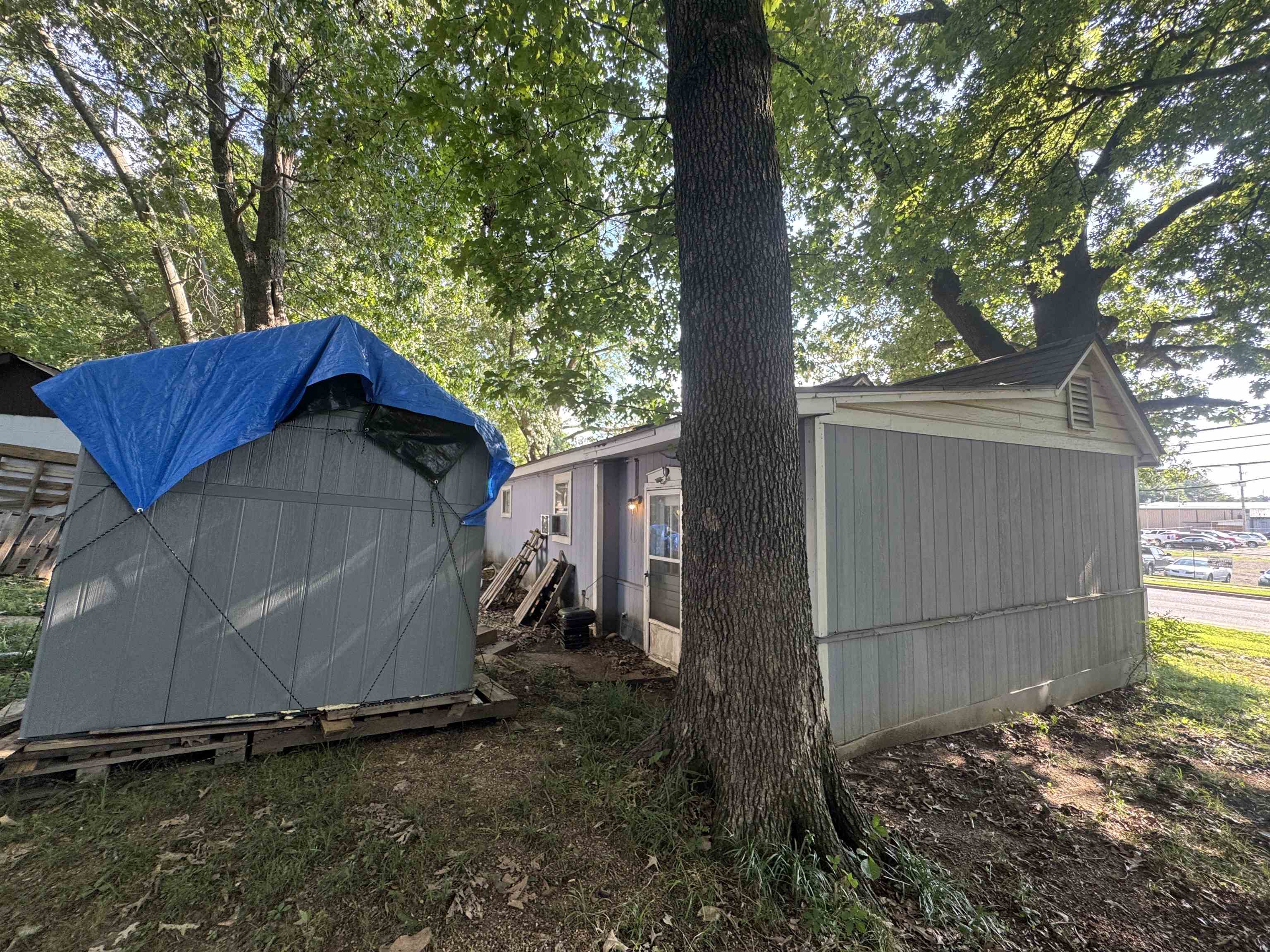 2166 Thomas Road Memphis, TN 38134 - Photo 8 of 10 Property exterior featuring horizontal siding and a gable roof with a small vent