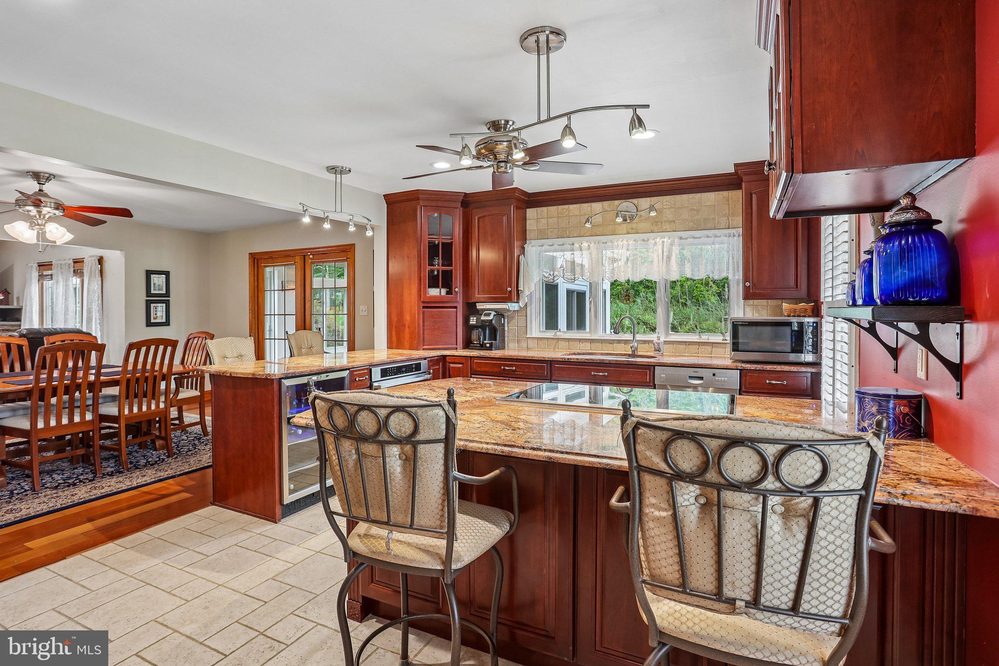 117 East Conestoga Road Elverson, PA 19520 - Photo 23 of 61 Well lit Kitchen with Breakfast Bar