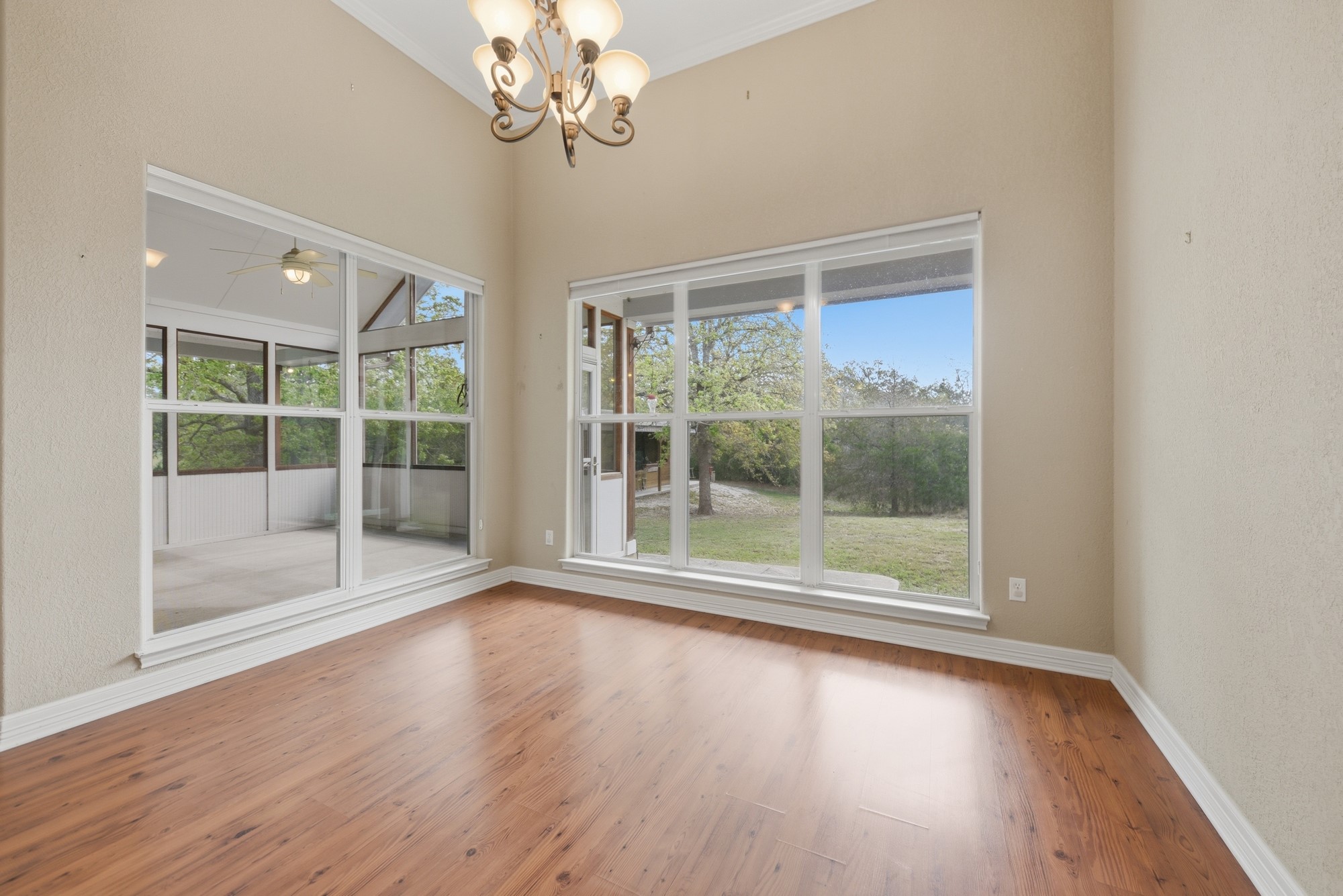 350 Owl Creek Road Giddings, TX 78942 - Photo 13 of 29 a view of a room with wooden floor and balcony