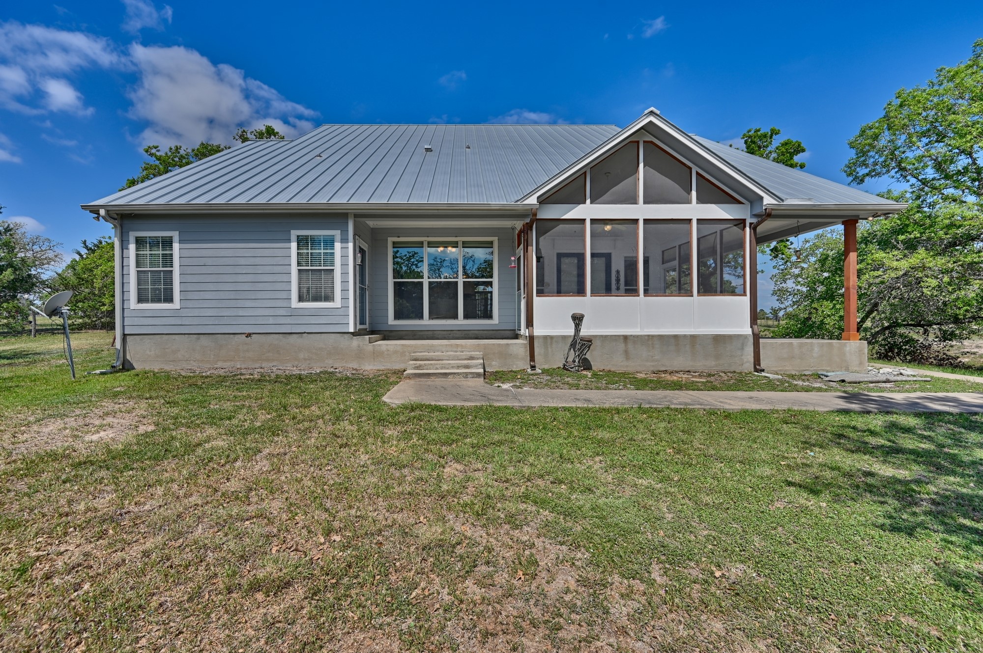 350 Owl Creek Road Giddings, TX 78942 - Photo 18 of 29 a front view of a house with a yard