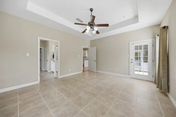 a view of a room with wooden floor and balcony