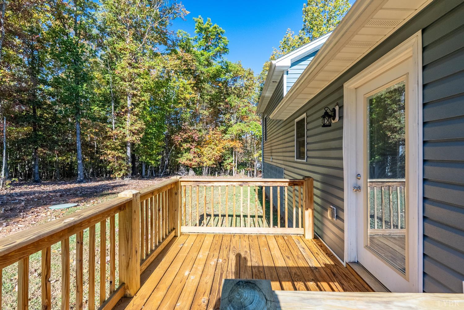 761 Chapel Grove Road Evington, VA 24550 - Photo 29 of 39 a view of balcony with wooden floor and fence