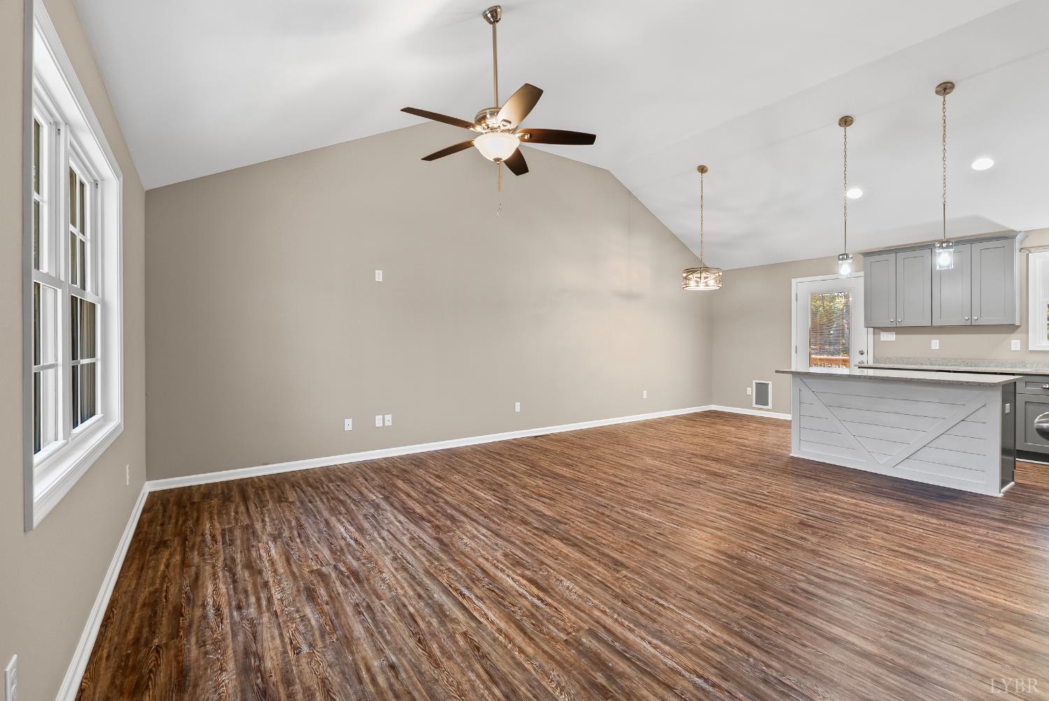 761 Chapel Grove Road Evington, VA 24550 - Photo 4 of 39 a view of empty room with wooden floor