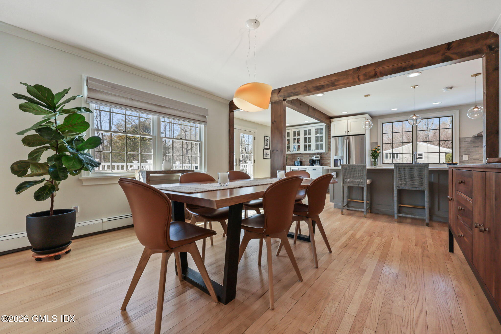 97 Davenport Ridge Lane Stamford, CT 06903 - Photo 9 of 31 a view of a dining room with furniture window and wooden floor