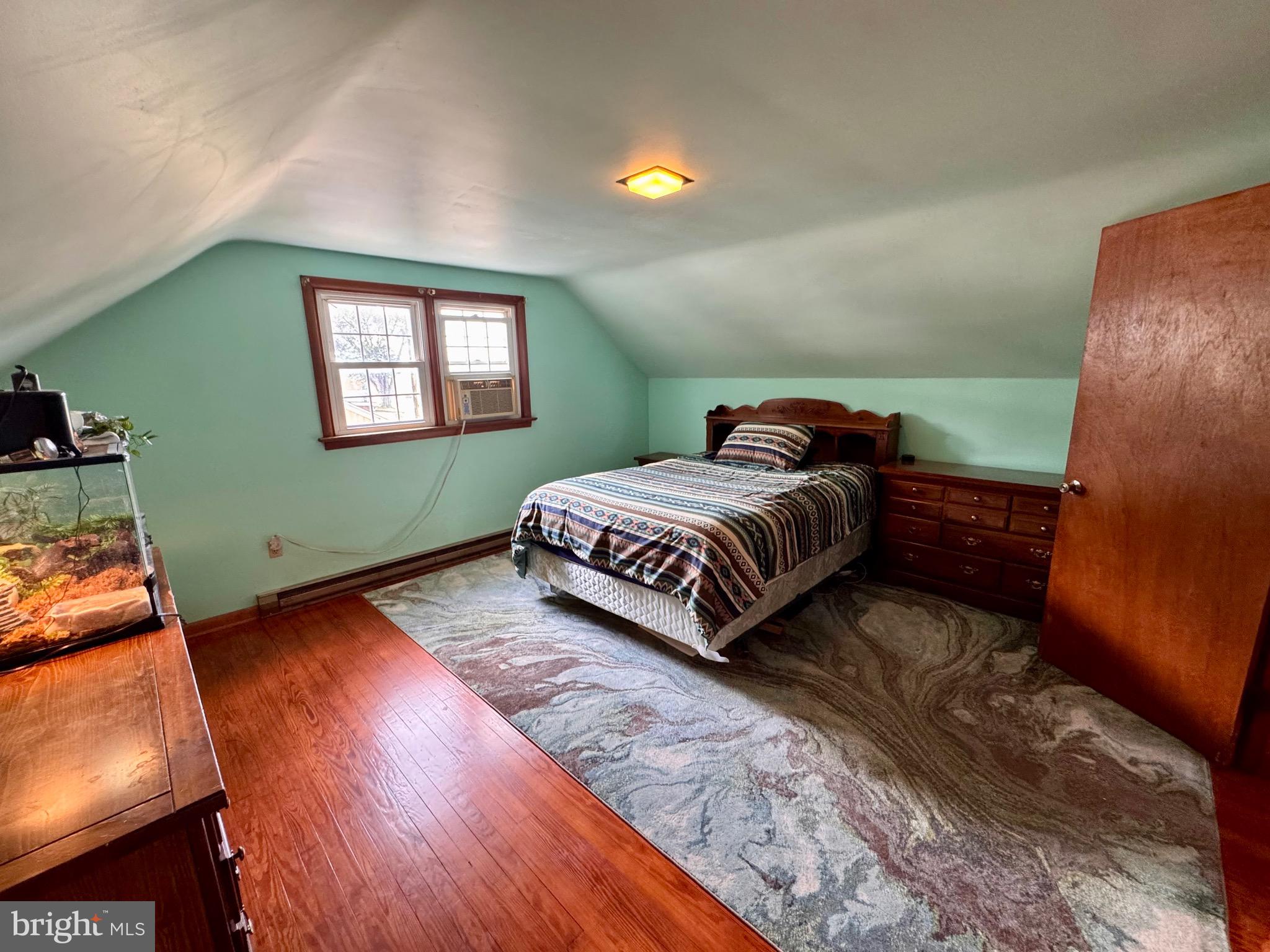 487 Prospect Road Manheim, PA 17545 - Photo 8 of 24 a bedroom with a bed and a window