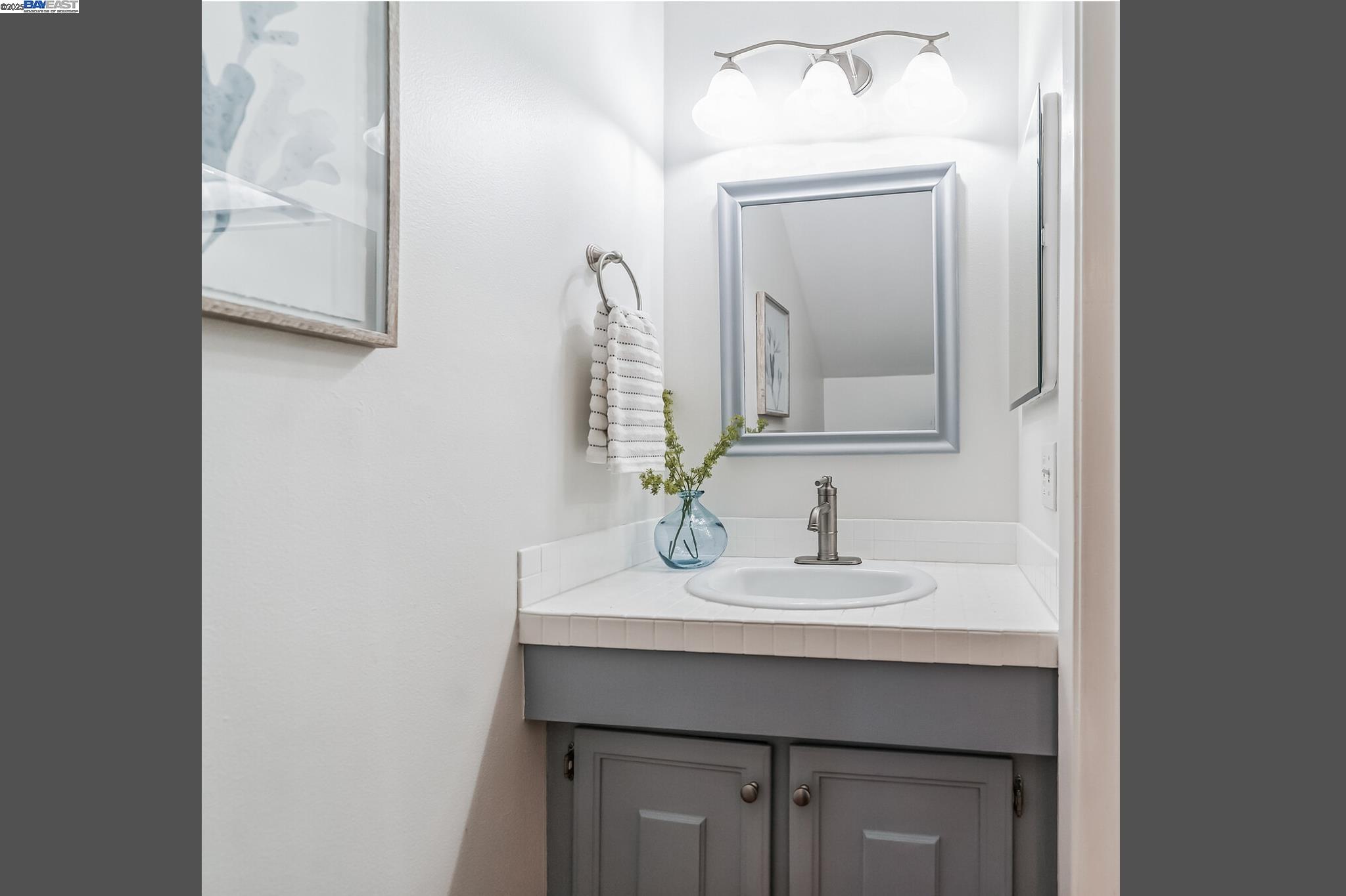 560 La Copita Court San Ramon, CA 94583 - Photo 18 of 40 a bathroom with a sink and a mirror