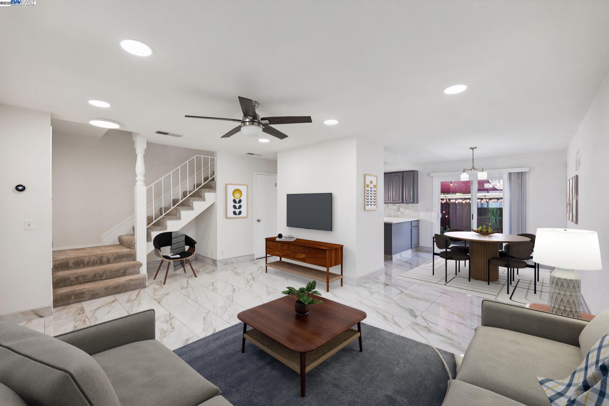 560 La Copita Court San Ramon, CA 94583 - Photo 2 of 40 a living room with furniture and a flat screen tv with wooden floor