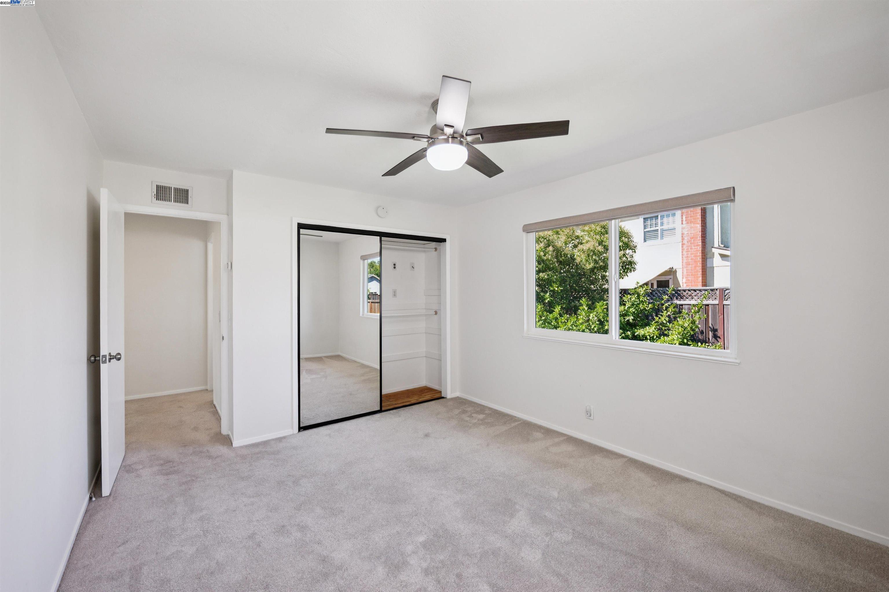 560 La Copita Court San Ramon, CA 94583 - Photo 21 of 40 wooden floor in an empty room with a window