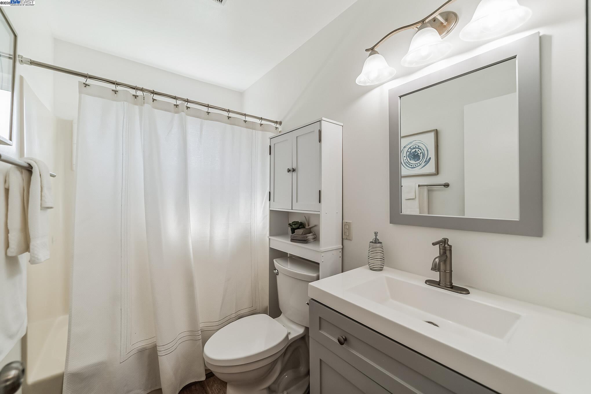 560 La Copita Court San Ramon, CA 94583 - Photo 22 of 40 a bathroom with a sink a toilet and shower