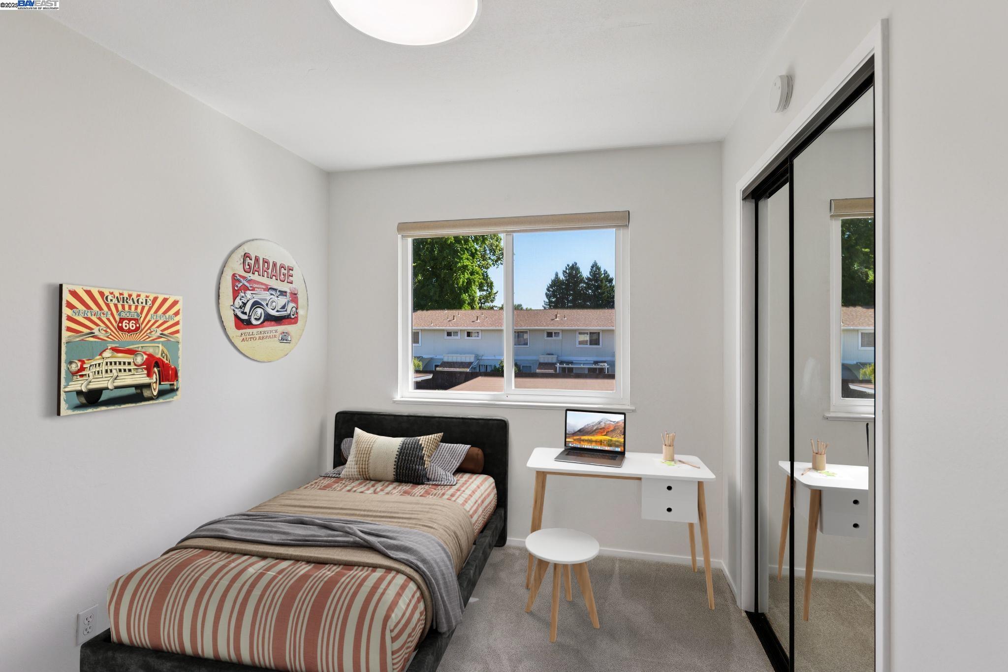 560 La Copita Court San Ramon, CA 94583 - Photo 23 of 40 a bed room with a bed and a painting on the wall