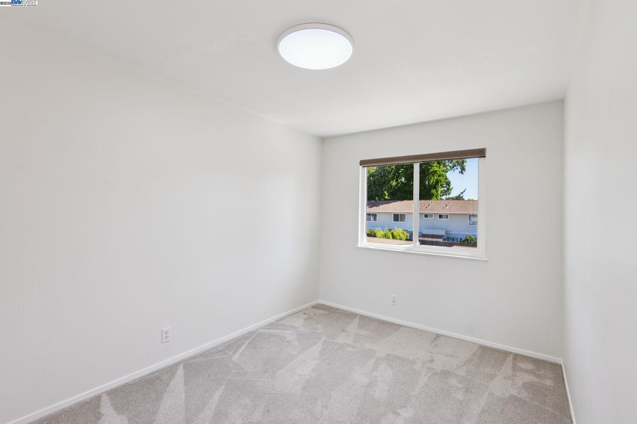 560 La Copita Court San Ramon, CA 94583 - Photo 28 of 40 a view of an empty room with a window