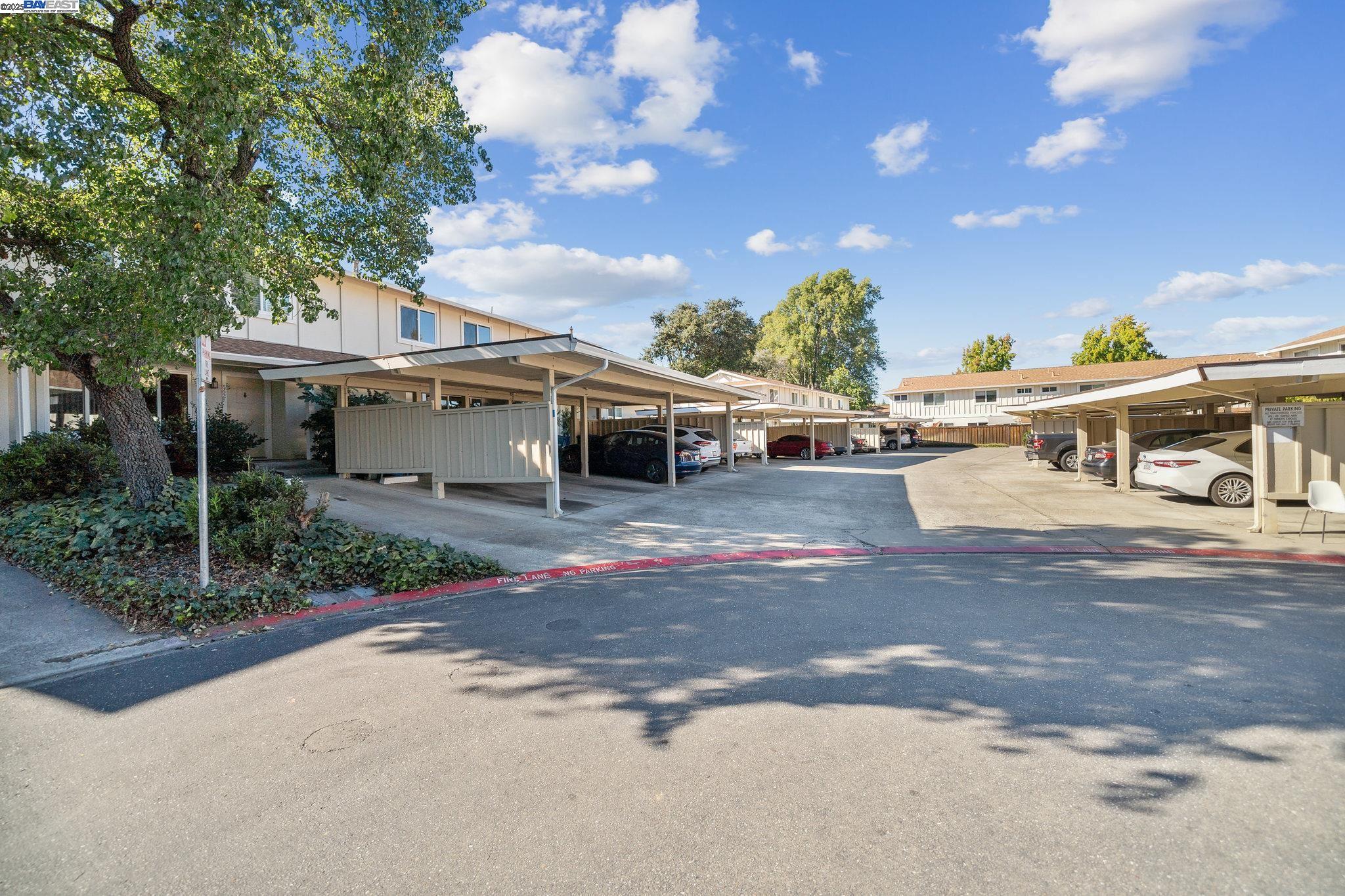 560 La Copita Court San Ramon, CA 94583 - Photo 34 of 40 a view of a white house next to a yard with big trees