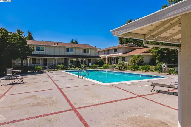 a view of house with outdoor space and porch