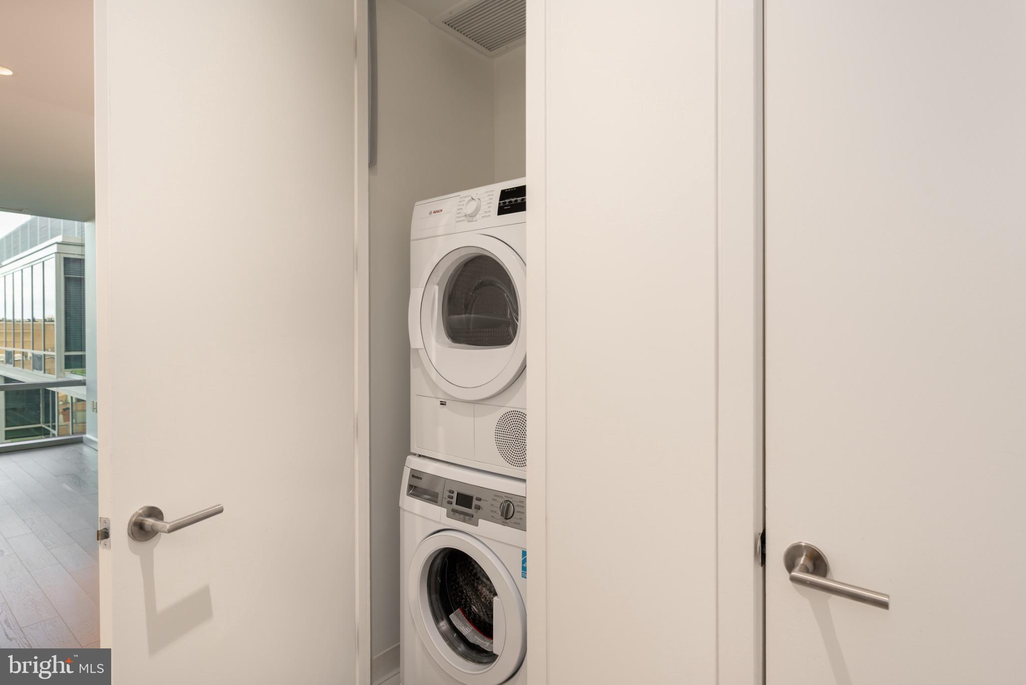 1110 23rd Street Northwest, Unit PH12 Washington, DC 20037 - Photo 8 of 19 a utility room with dryer and washer
