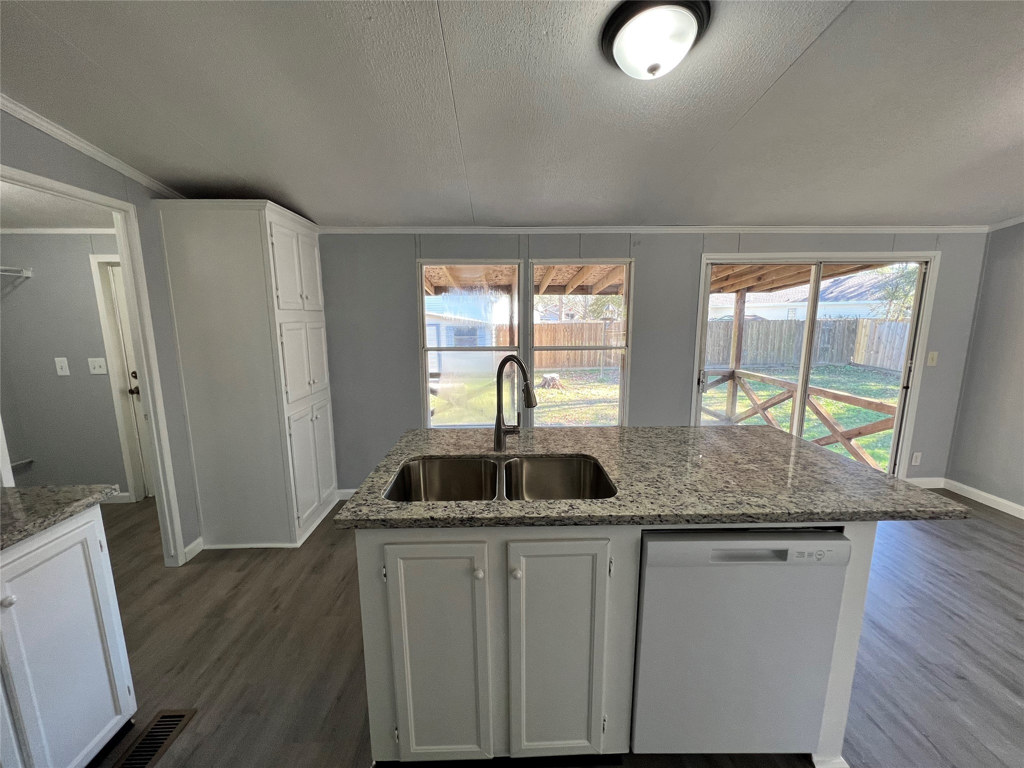 16105 Lone Star Ranch Drive Conroe, TX 77302 - Photo 11 of 24 a kitchen with sink and window