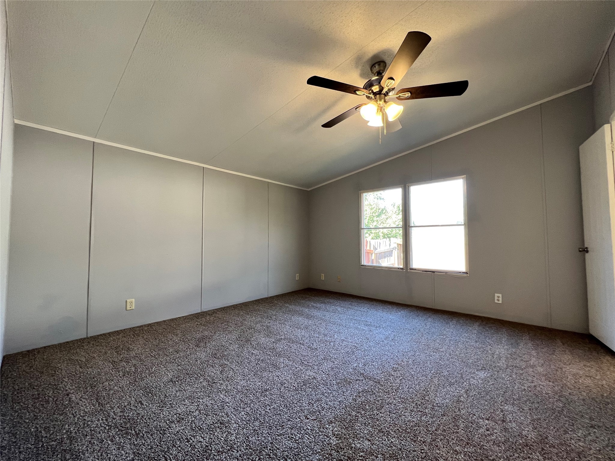 16105 Lone Star Ranch Drive Conroe, TX 77302 - Photo 14 of 24 a view of an empty room with a window