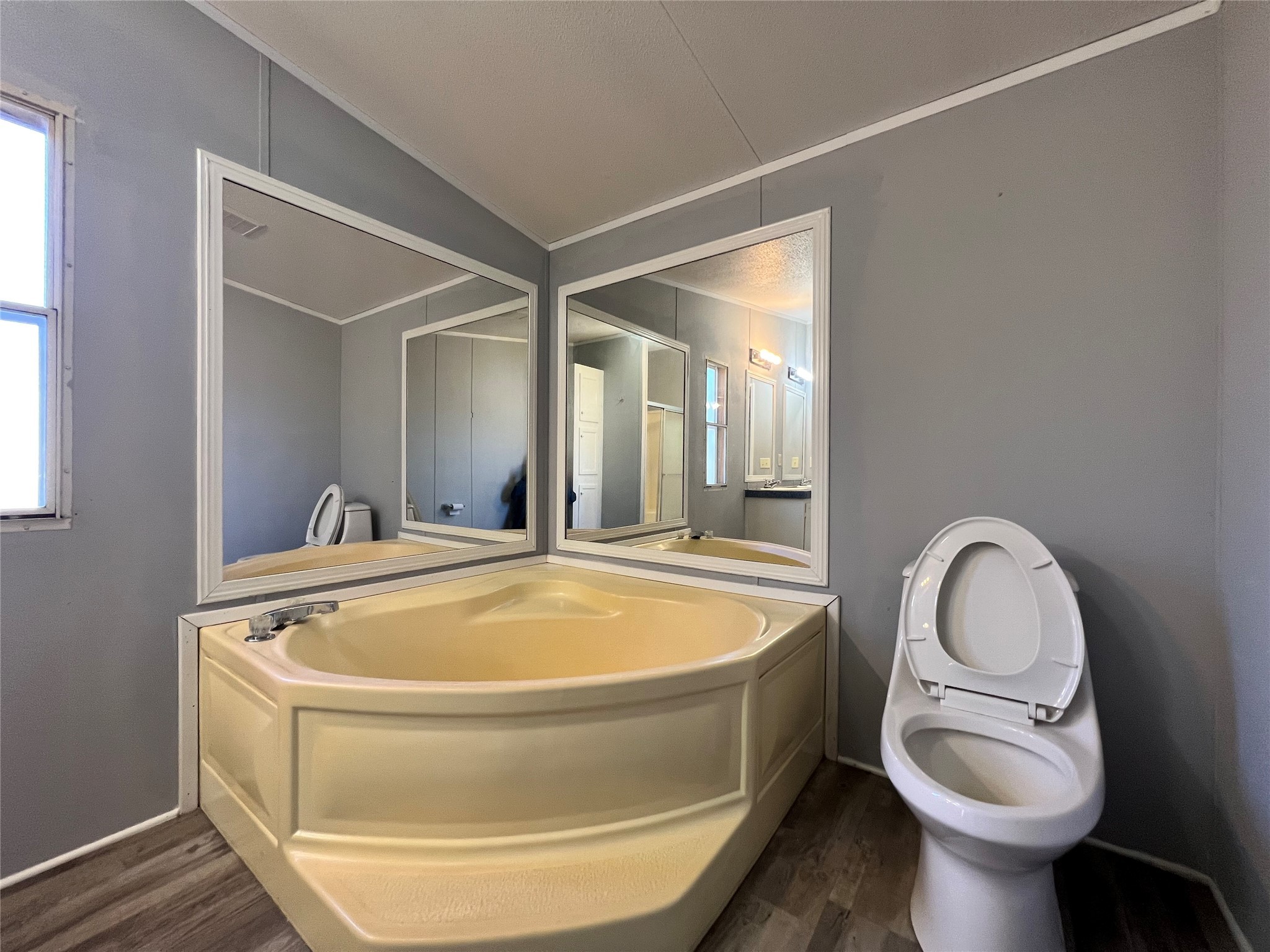 16105 Lone Star Ranch Drive Conroe, TX 77302 - Photo 17 of 24 a bathroom with toilet sink and mirror