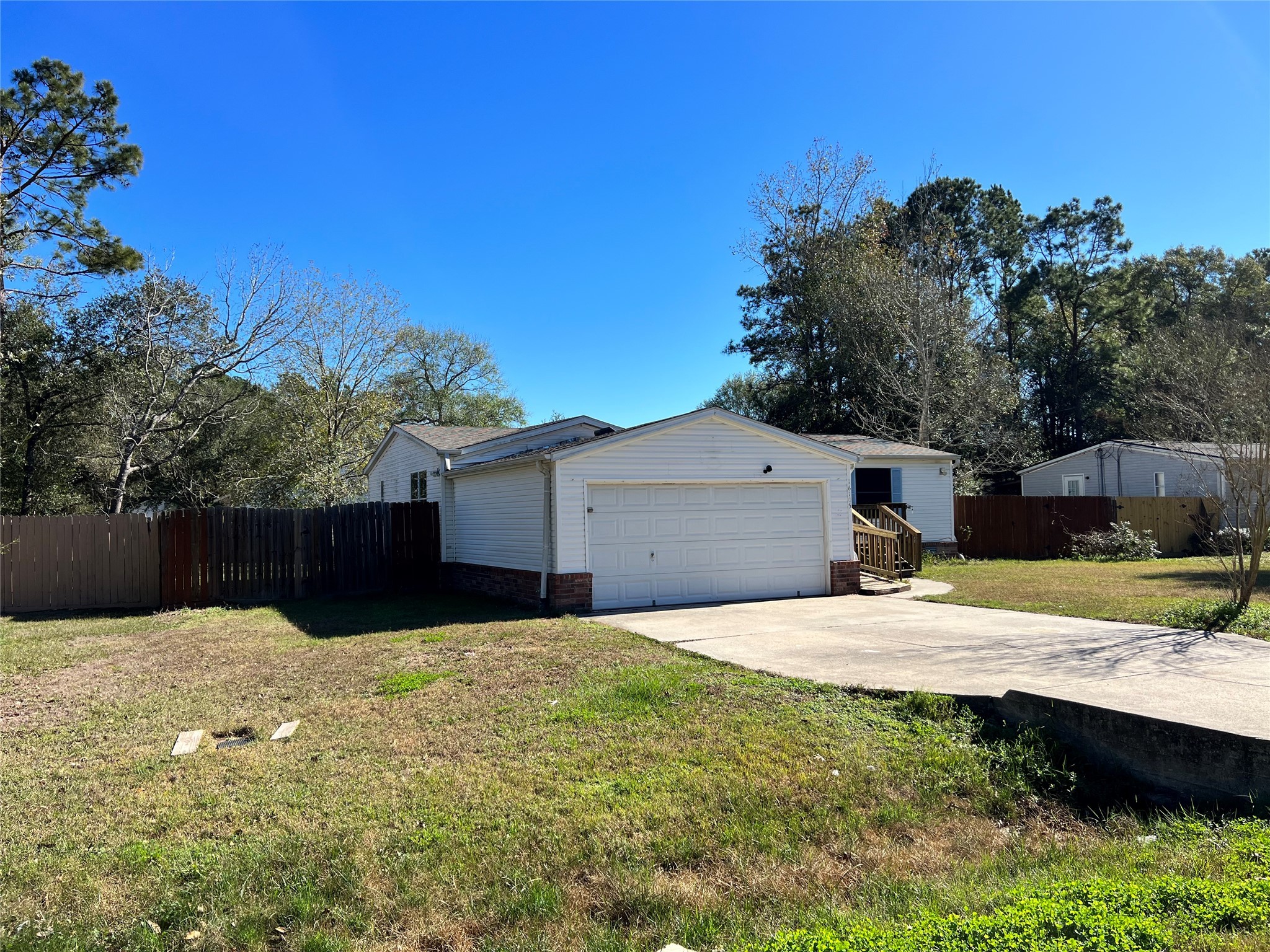 16105 Lone Star Ranch Drive Conroe, TX 77302 - Photo 3 of 24 a house view with a outdoor space