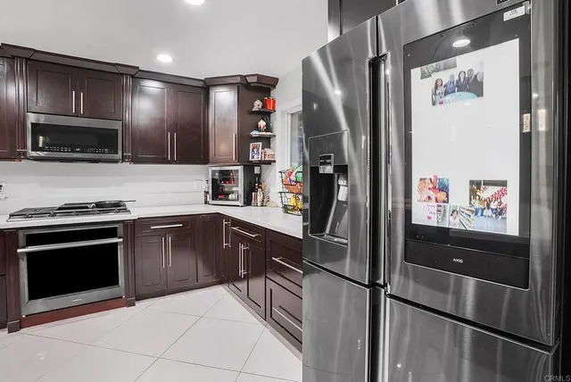 a view of room with window and hardwood floor