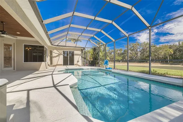 a view of a house with a swimming pool