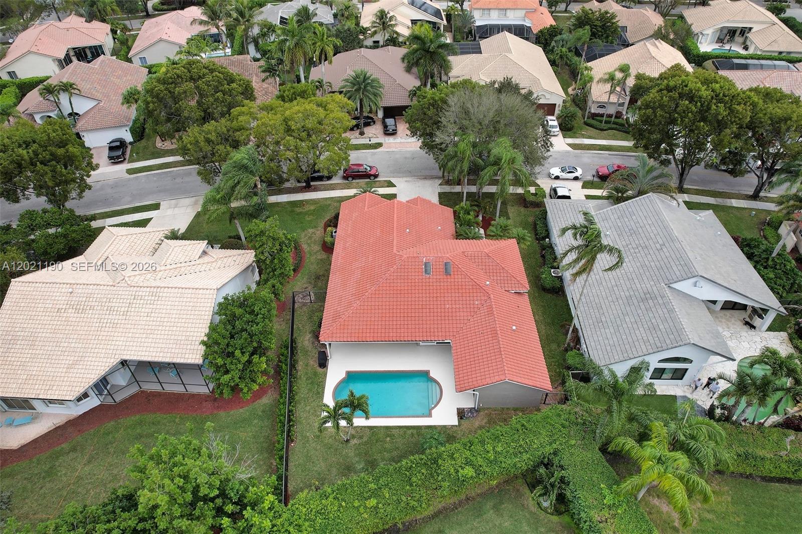 814 Heron Road Weston, FL 33326 - Photo 24 of 27 an aerial view of multiple houses with yard