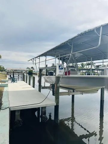 a view of a chairs and table in a patio