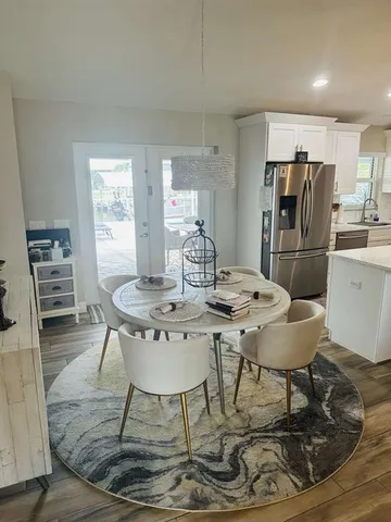 a view of a dining room with furniture
