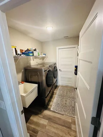 a utility room with dryer and washer