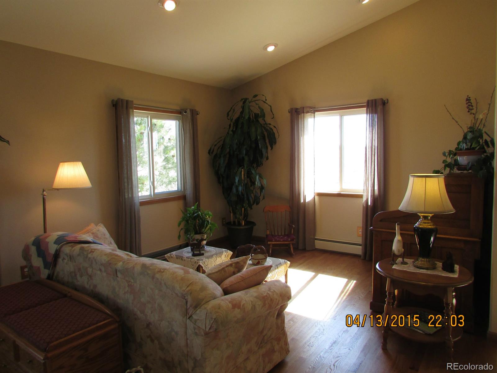 6202 Lorraine Road Larkspur, CO 80118 - Photo 11 of 35 a living room with furniture and a window