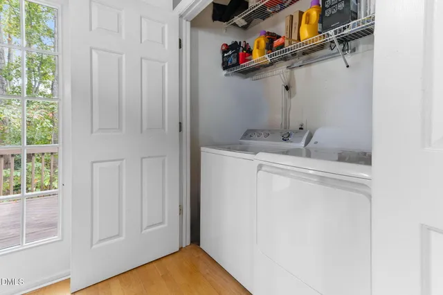 a kitchen with stainless steel appliances a refrigerator sink and cabinets