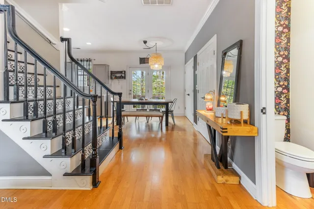 a view of a house with a yard and garage