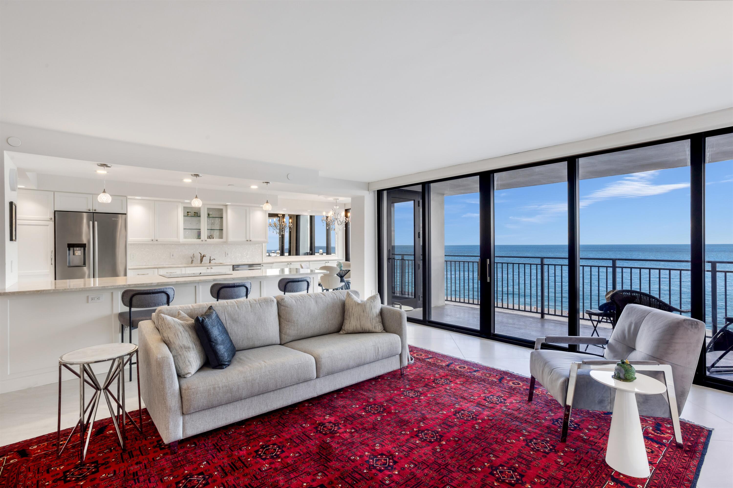 1800 South Ocean Boulevard, Unit 6B Boca Raton, FL 33432 - Photo 2 of 34 a living room with furniture and a large window