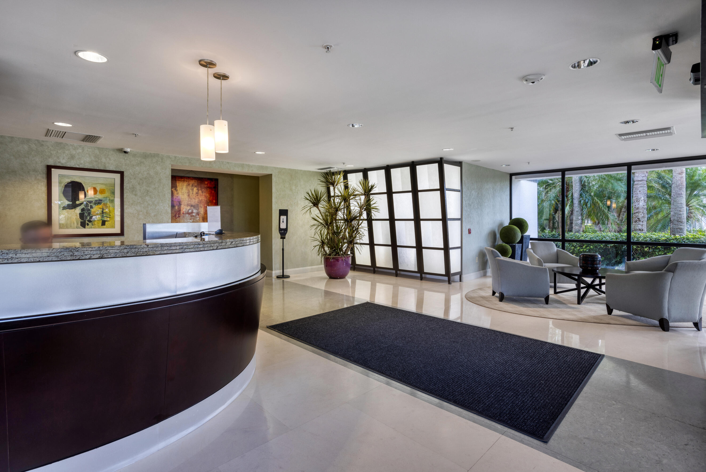 1800 South Ocean Boulevard, Unit 6B Boca Raton, FL 33432 - Photo 23 of 34 a living room with furniture and a large window