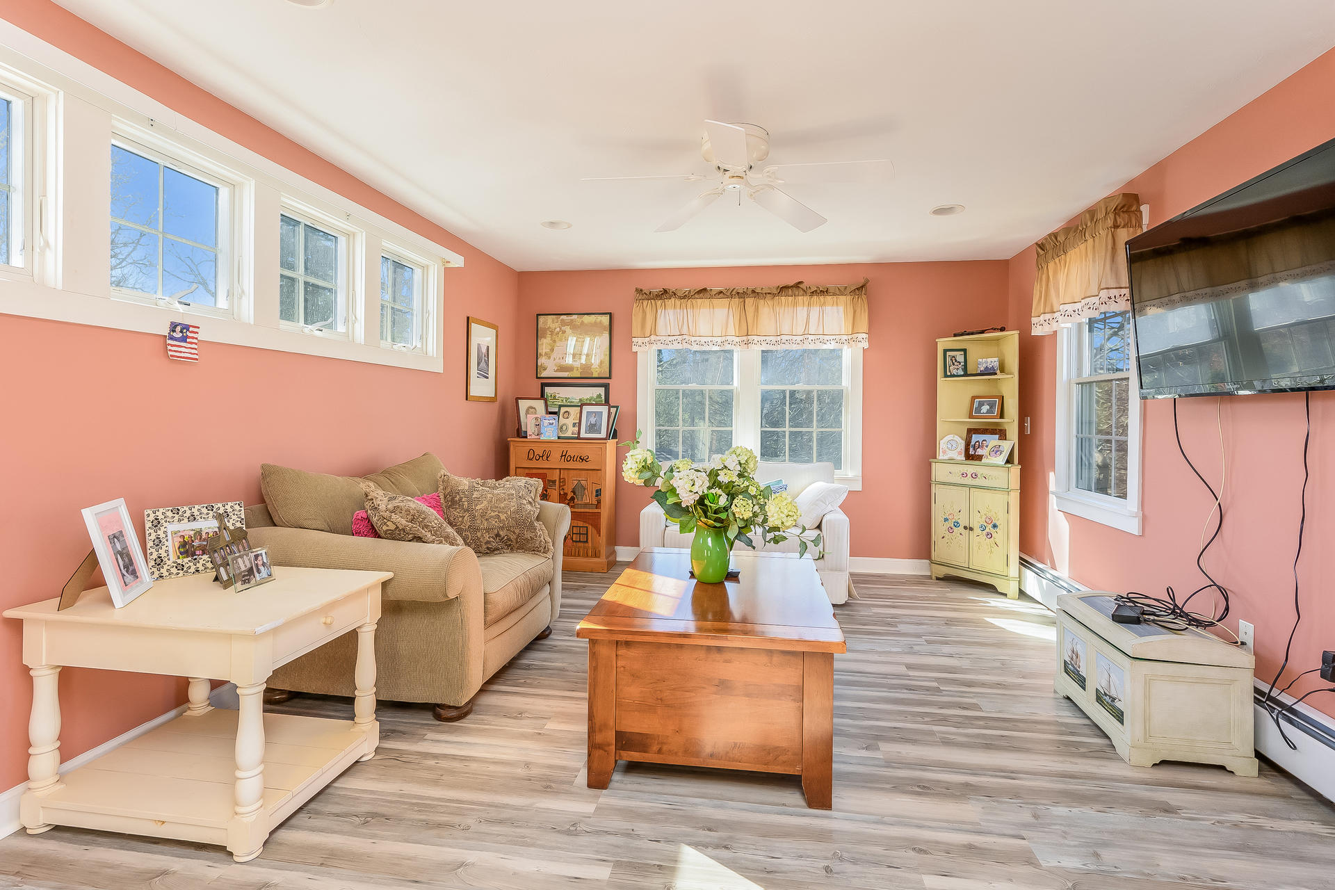 271 Pine Street Centerville, MA 02632 - Photo 9 of 22 a living room with furniture and potted plants