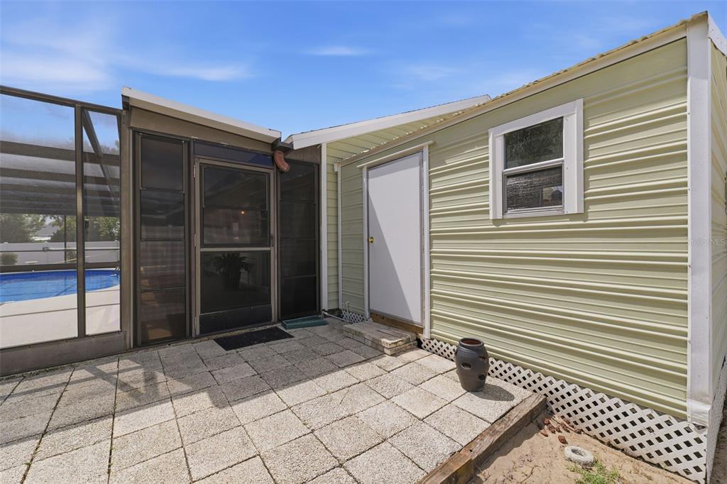 11224 Holbrook Street Spring Hill, FL 34609 - Photo 40 of 55 a view of backyard with cabin