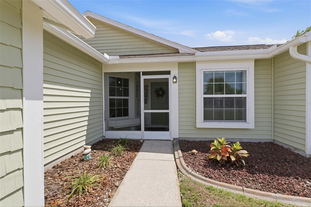 11224 Holbrook Street Spring Hill, FL 34609 - Photo 5 of 55 a front view of a house