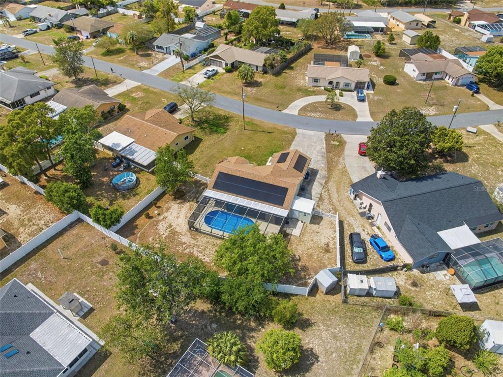 11224 Holbrook Street Spring Hill, FL 34609 - Photo 53 of 55 an aerial view of a house with a yard and garden