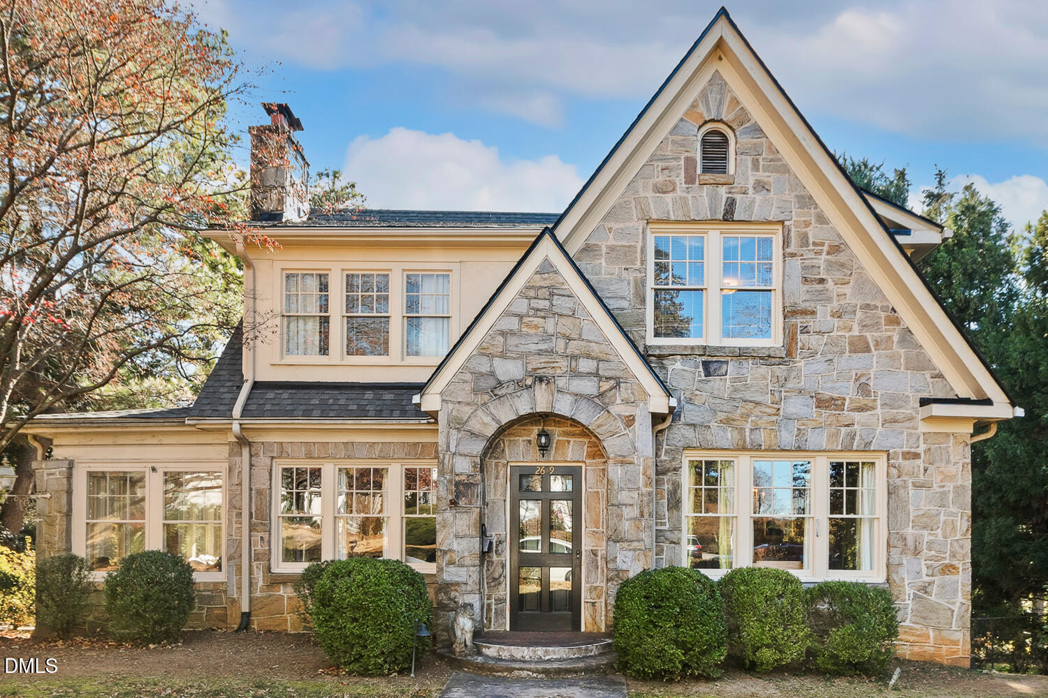 front view of a house with a yard