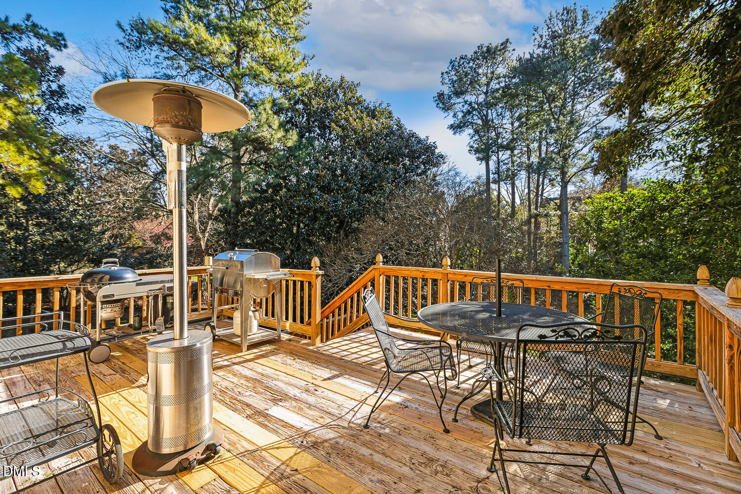 2619 Fairview Road Raleigh, NC 27608 - Photo 2 of 4 a view of balcony with wooden floor and outdoor seating