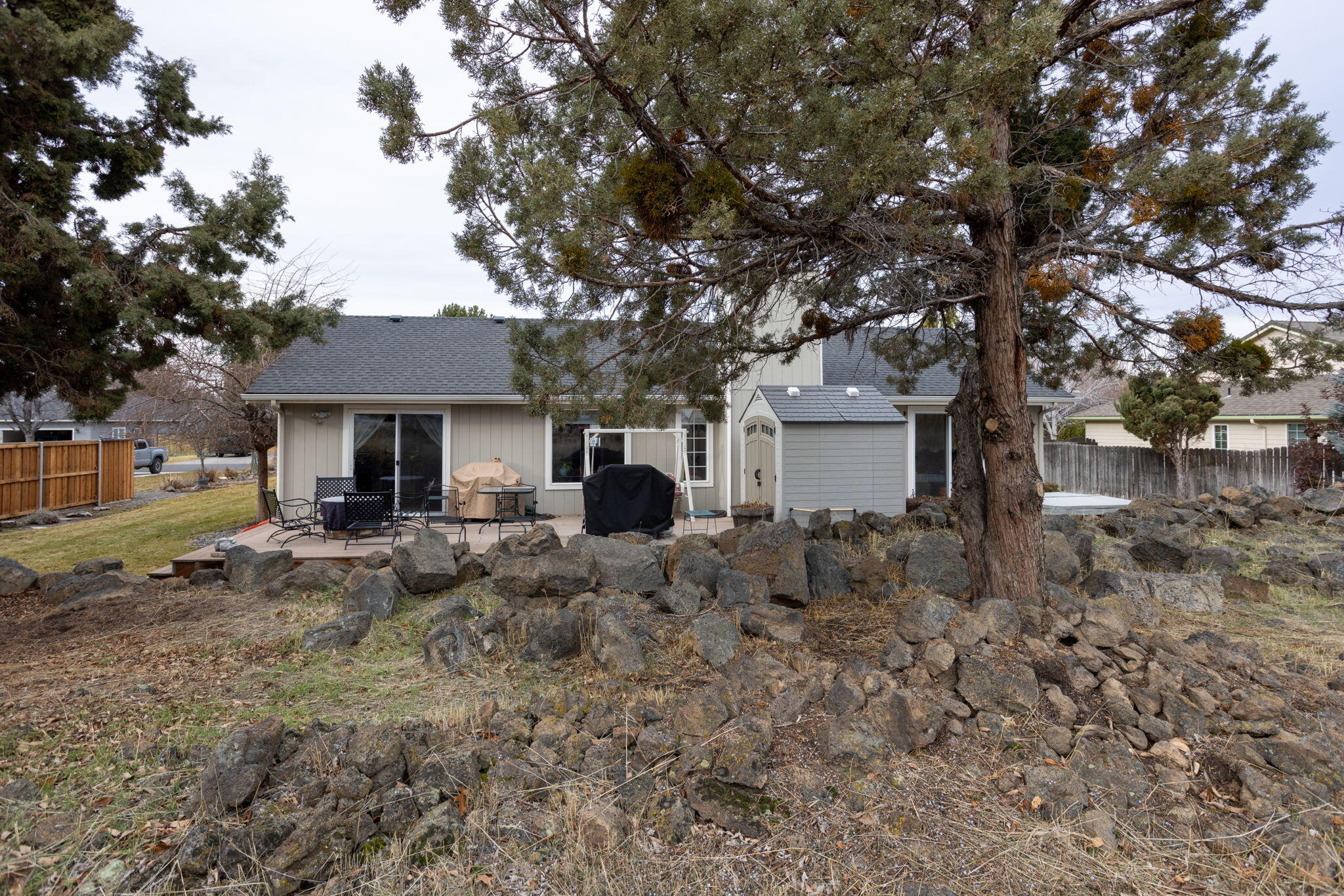 3375 Northeast Stonebrook Loop Bend, OR 97701 - Photo 27 of 27 a view of a house with a yard and large tree