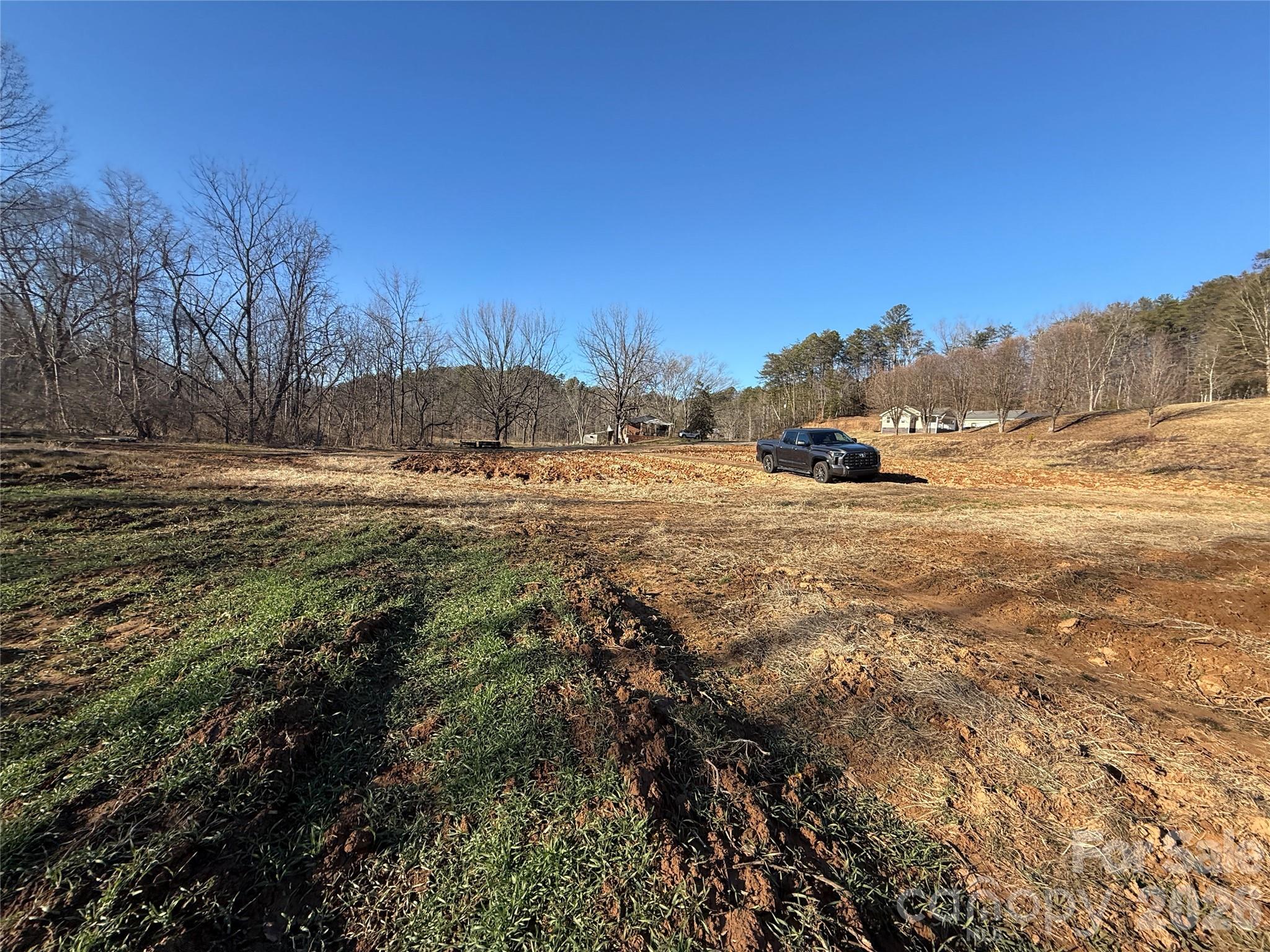 0 Old Fort Sugar Hill Road Marion, NC 28752 - Photo 13 of 35 a view of dirt yard with large trees
