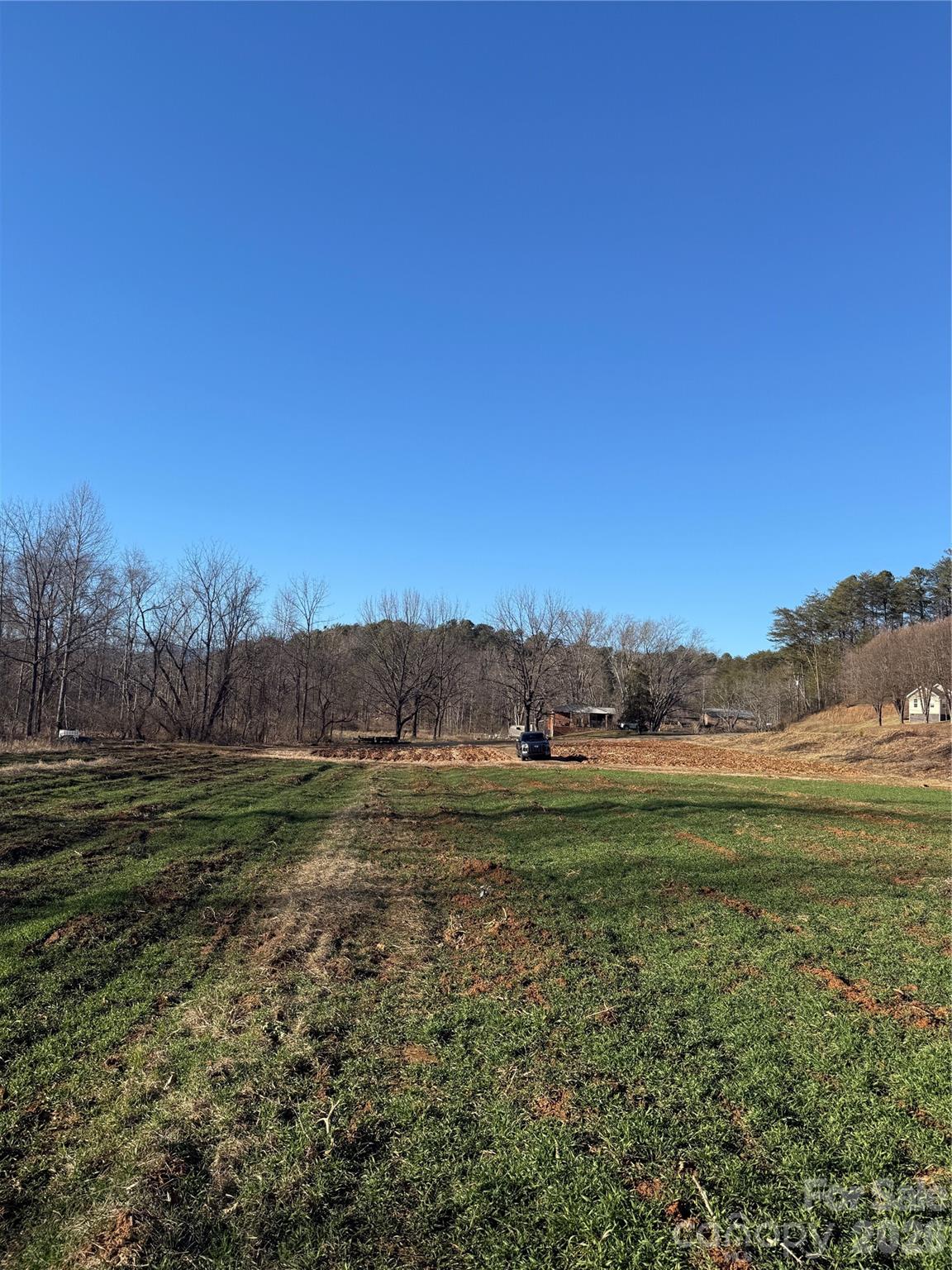 0 Old Fort Sugar Hill Road Marion, NC 28752 - Photo 16 of 35 a view of grassy field with mountain
