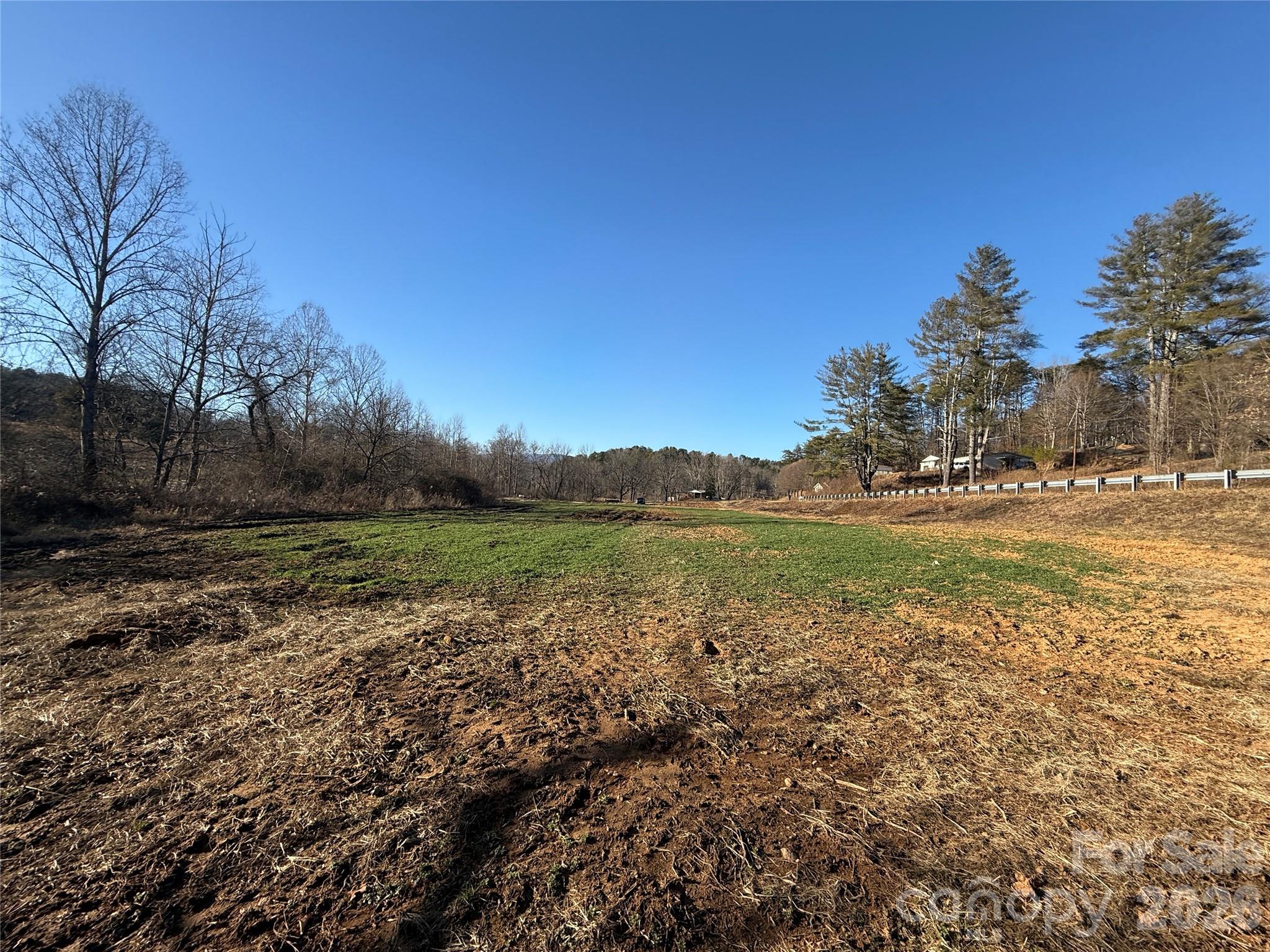 0 Old Fort Sugar Hill Road Marion, NC 28752 - Photo 23 of 35 a view of a lake with mountains in the background