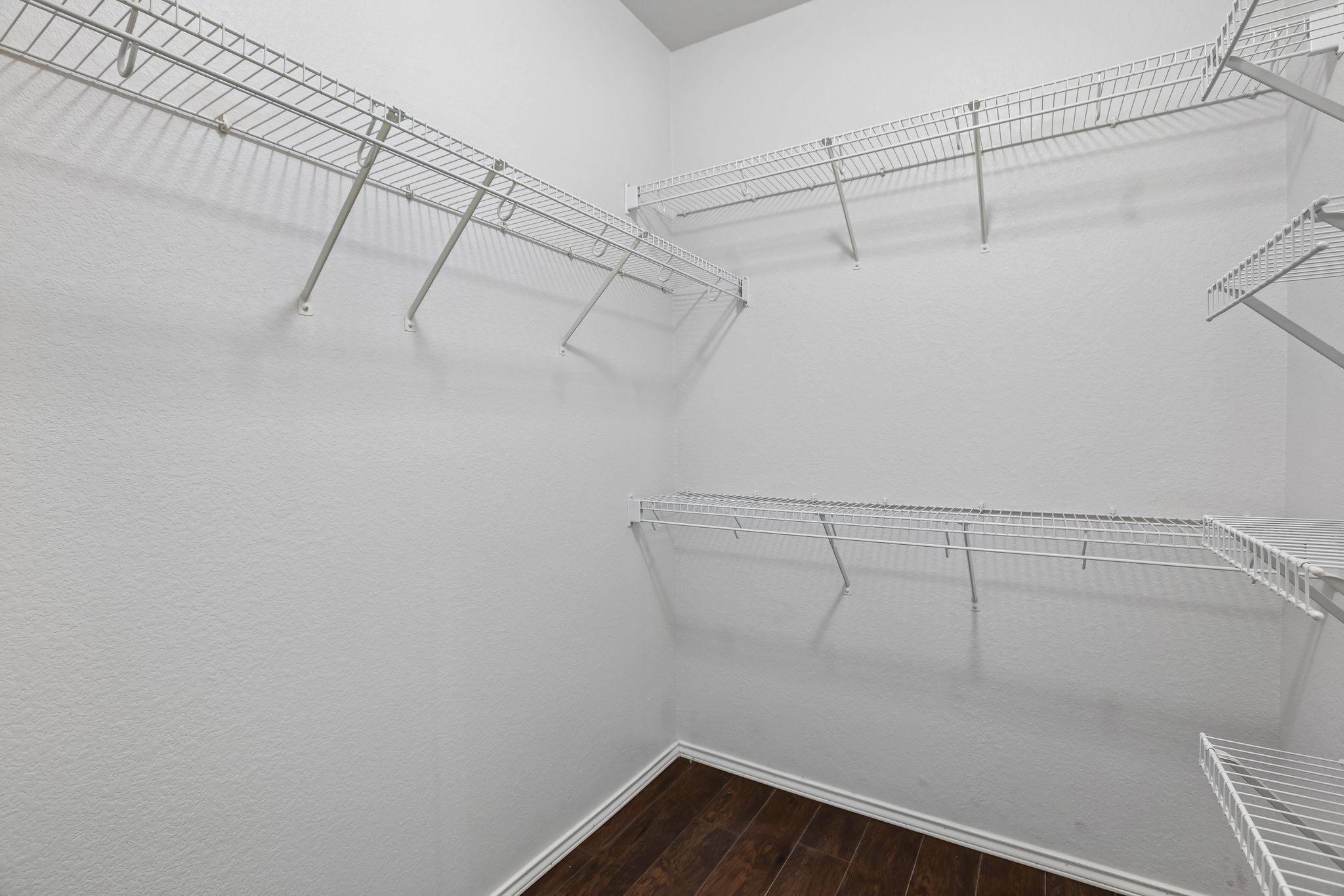 1721 Long Rifle Drive Austin, TX 78754 - Photo 16 of 38 Ample wire shelving units offer plentiful storage in this conveniently organized closet.