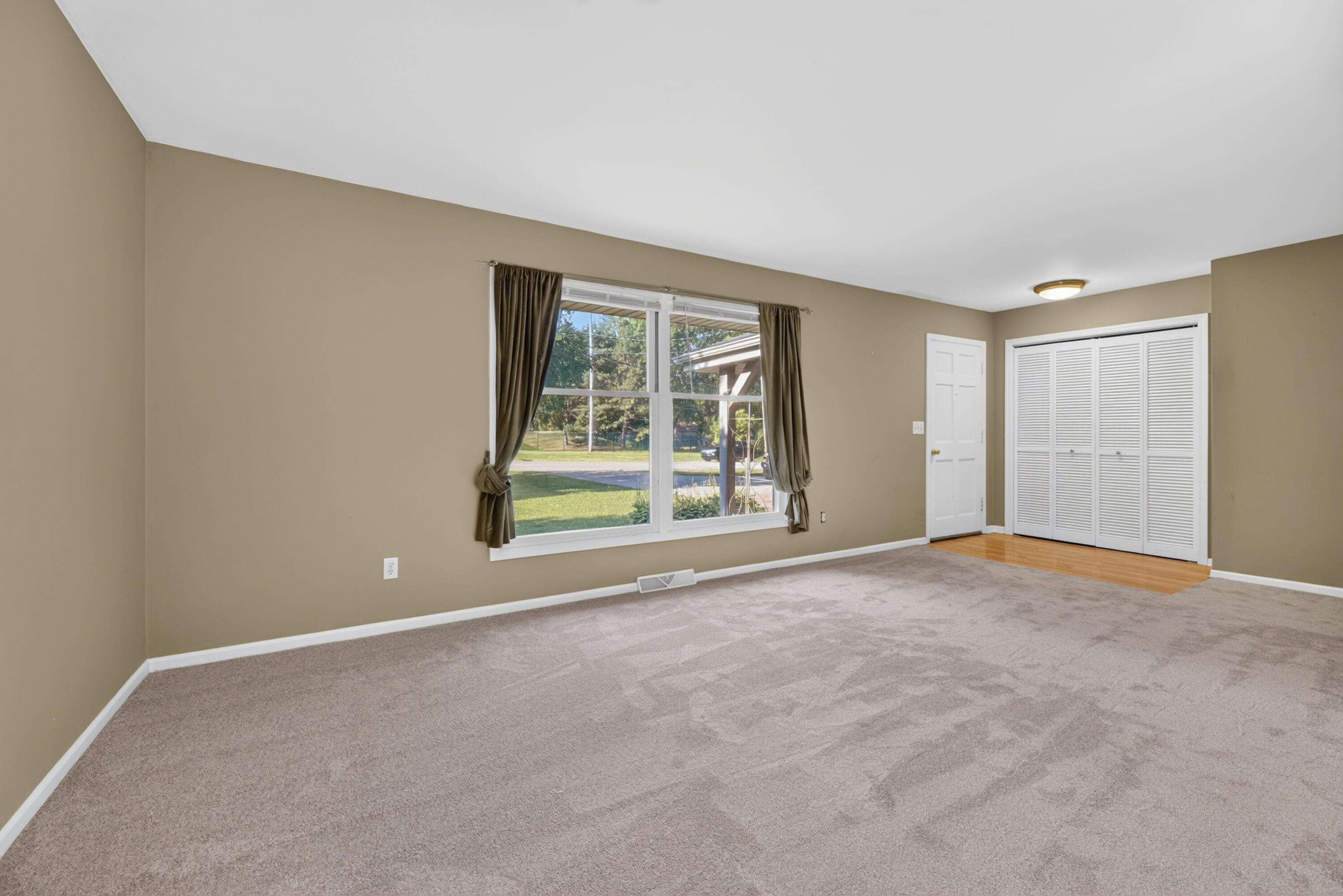 N56-w29354 County Rd K Hartland, WI 53029 - Photo 4 of 24 Living room looking to front foyer