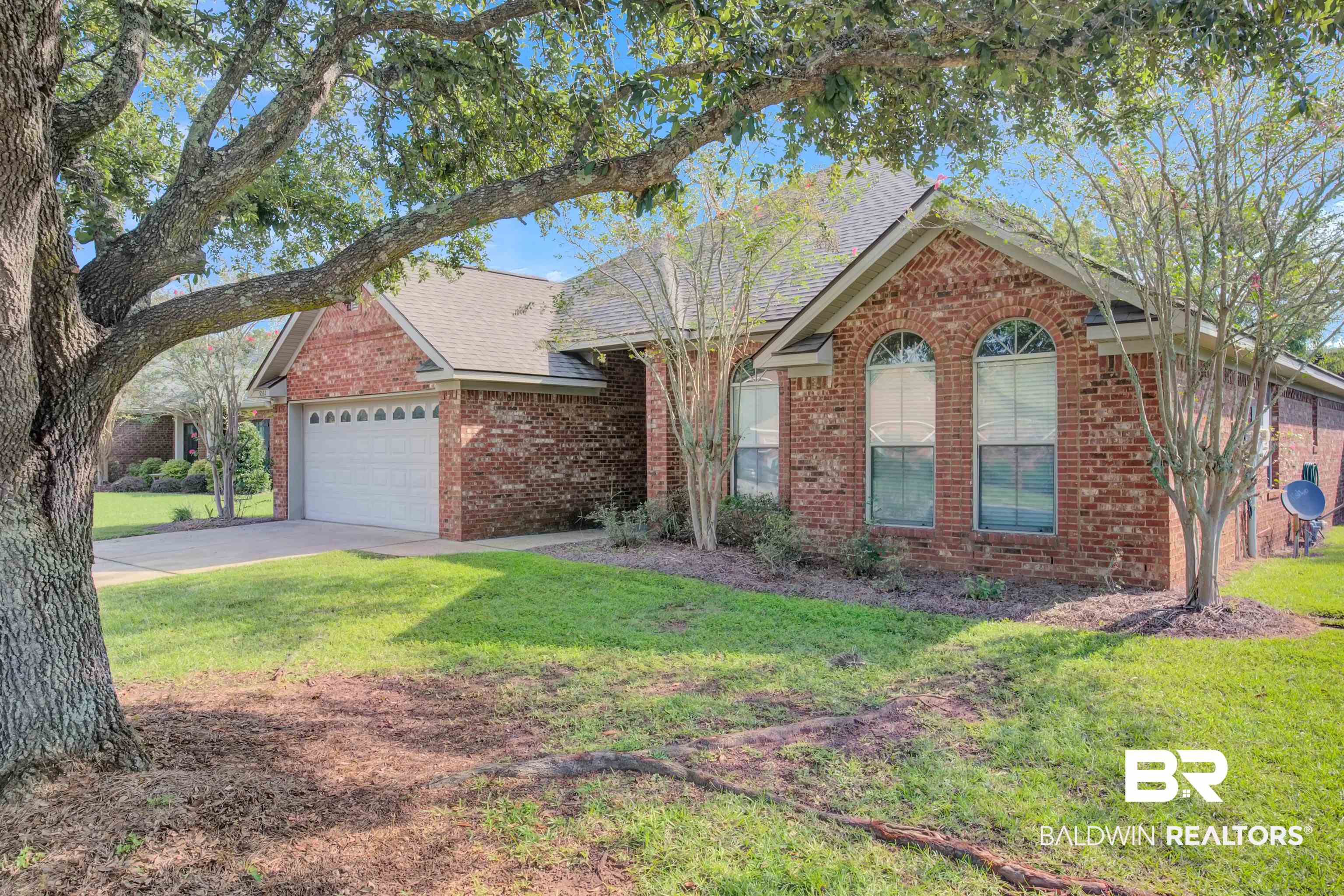 9532 Collier Loop Daphne, AL 36526 - Photo 39 of 45 View of front of house with a garage and a front yard