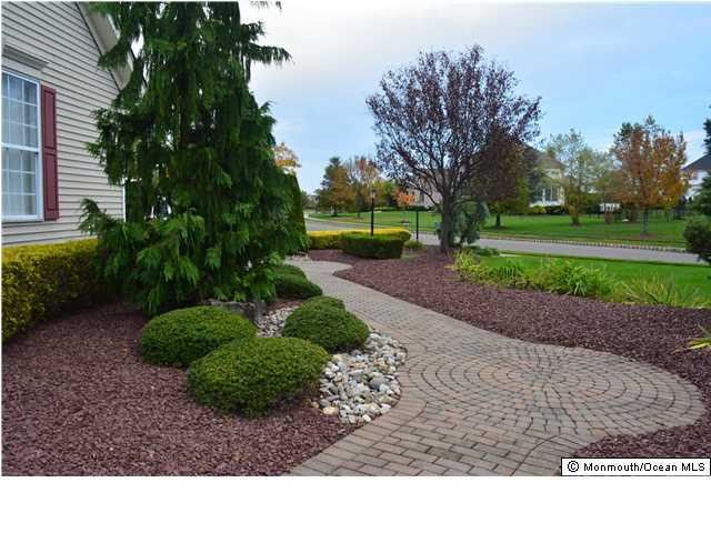 186 Pin Oak Road Freehold, NJ 07728 - Photo 3 of 23 a black and white photo of a house