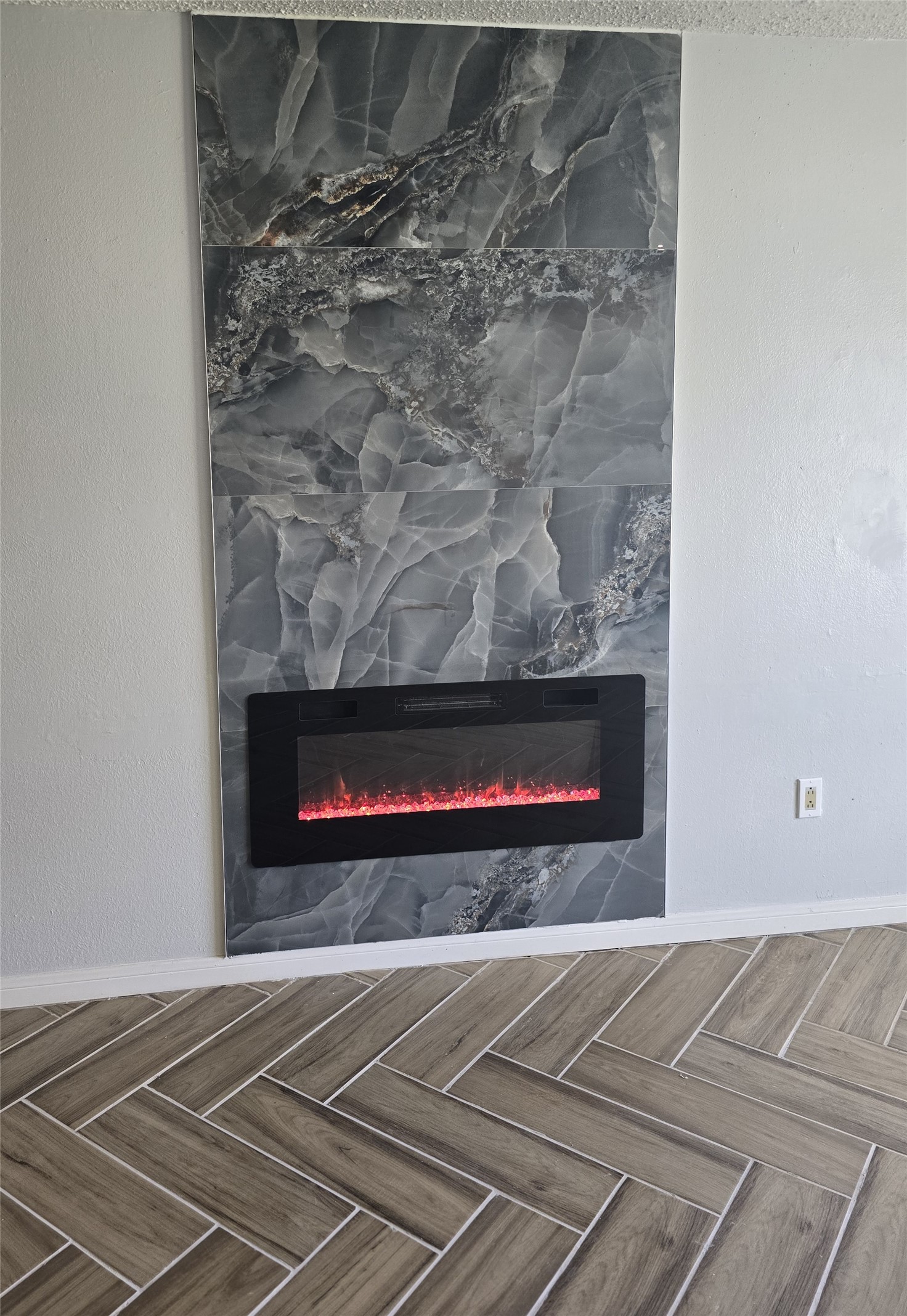 805 Sissom Road Killeen, TX 76541 - Photo 11 of 35 Detailed view of a large fireplace and parquet flooring