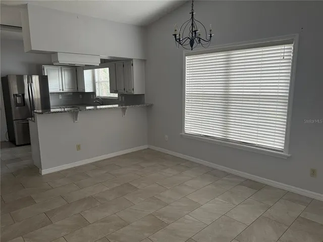 a view of a kitchen with a sink